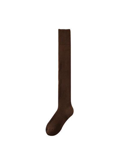 Dark brown over-the-knee sock with a wide ribbed cuff on a white background