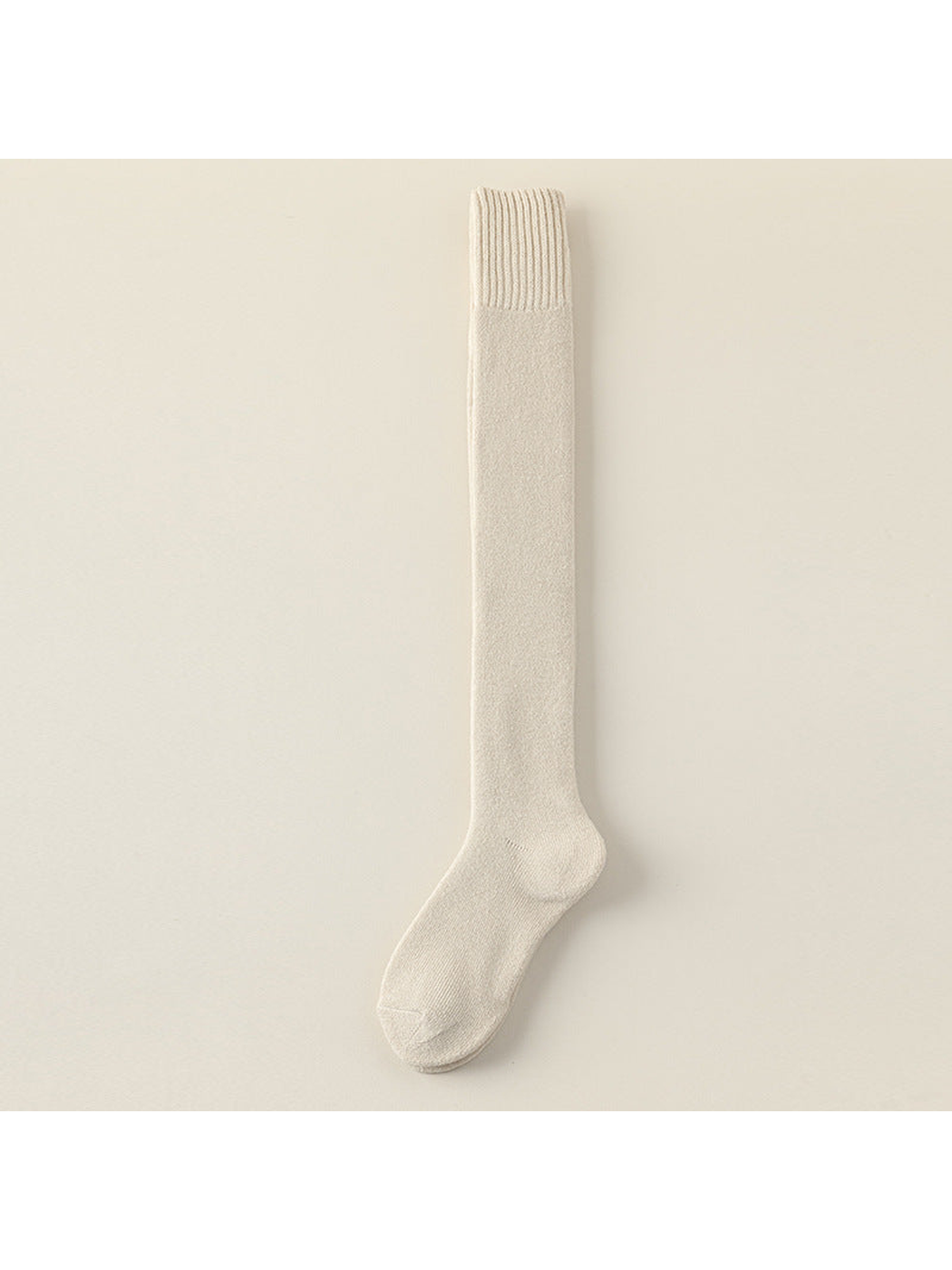Cream over-the-knee sock with a wide ribbed cuff