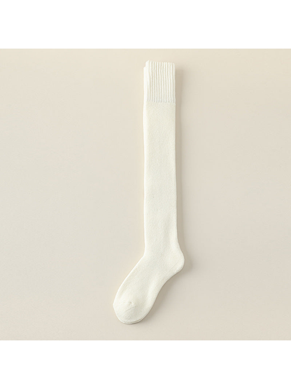 White over-the-knee sock with a wide ribbed cuff