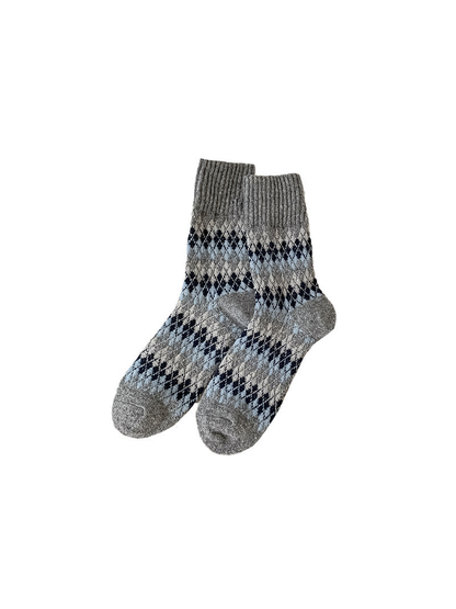 Gray argyle crew socks with light blue and navy pattern