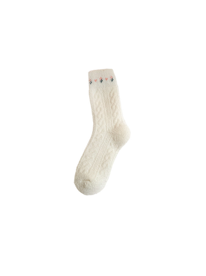 Ivory cable-textured crew sock with small cuff motifs, full view