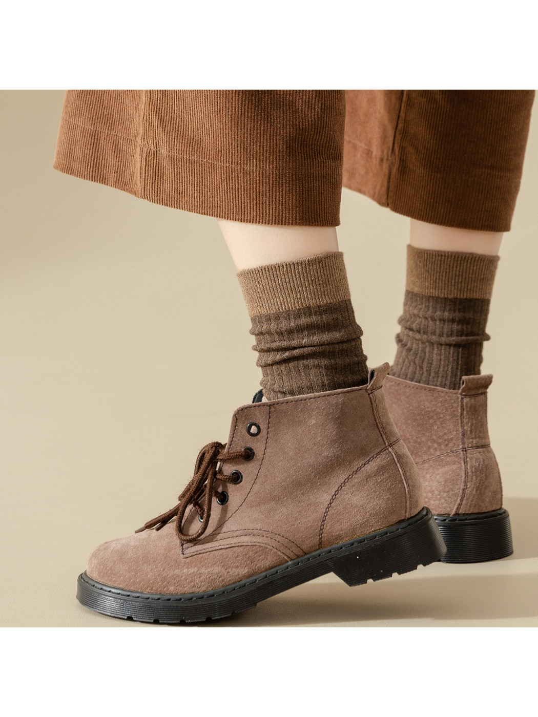 Brown ribbed crew socks styled with ankle boots