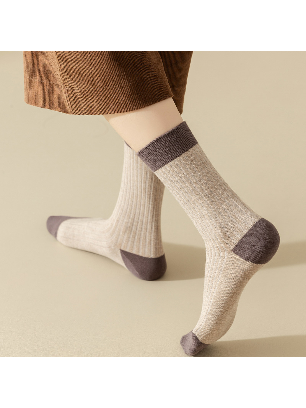 Beige ribbed crew socks with contrasting heel and toe panels, rear view