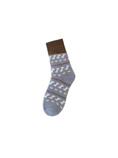 Gray-blue crew sock with white and yellow motifs and a brown ribbed cuff