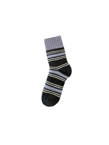 Black crew sock with gray, ivory and pale-yellow horizontal stripes