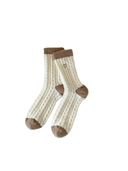 Ivory fuzzy crew socks with an outlined heart and brown contrast panels