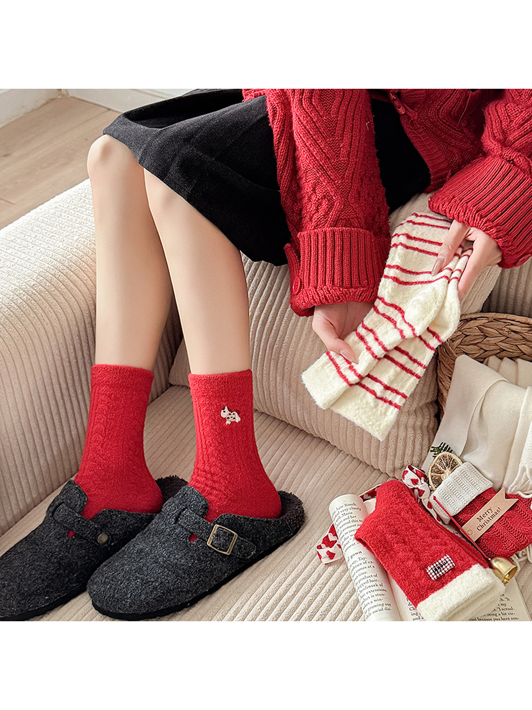 Red embroidered fuzzy crew socks styled with coordinating striped socks