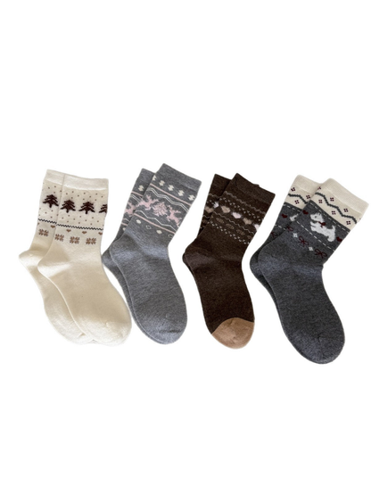 Four patterned crew sock styles arranged on a white background