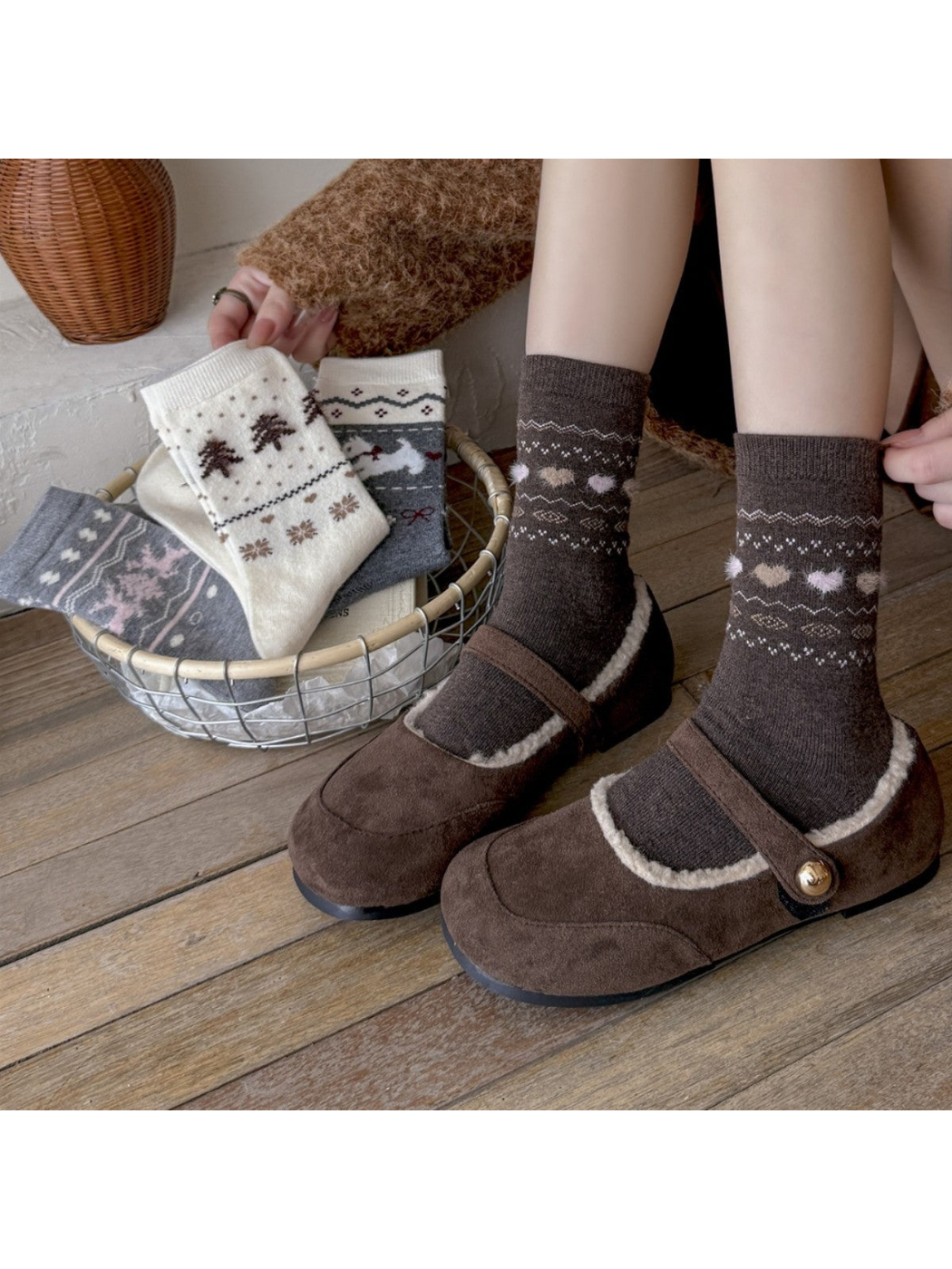 Dark brown heart-pattern crew socks worn with brown shoes beside the other styles