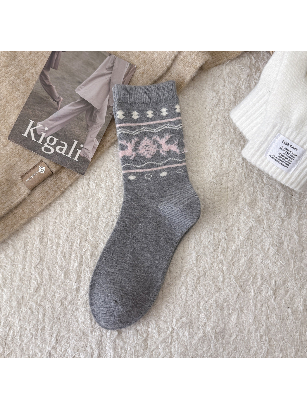 Light gray crew sock with pink deer and snowflake motif