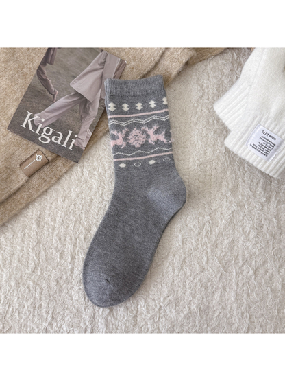 Light gray crew sock with pink deer and snowflake motif