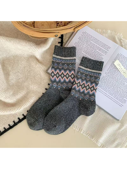 Dark gray geometric crew socks with pink and blue accents