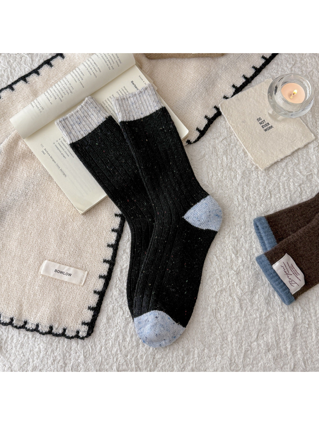 Black speckled crew socks with pale gray cuff, heel and toe