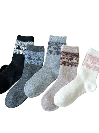 Five color variants of bow-pattern crew socks arranged together