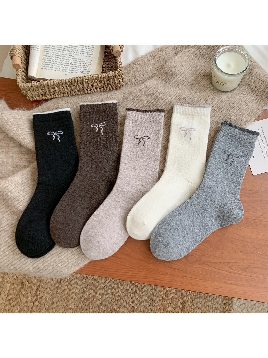 Five colors of bow-motif crew socks displayed together