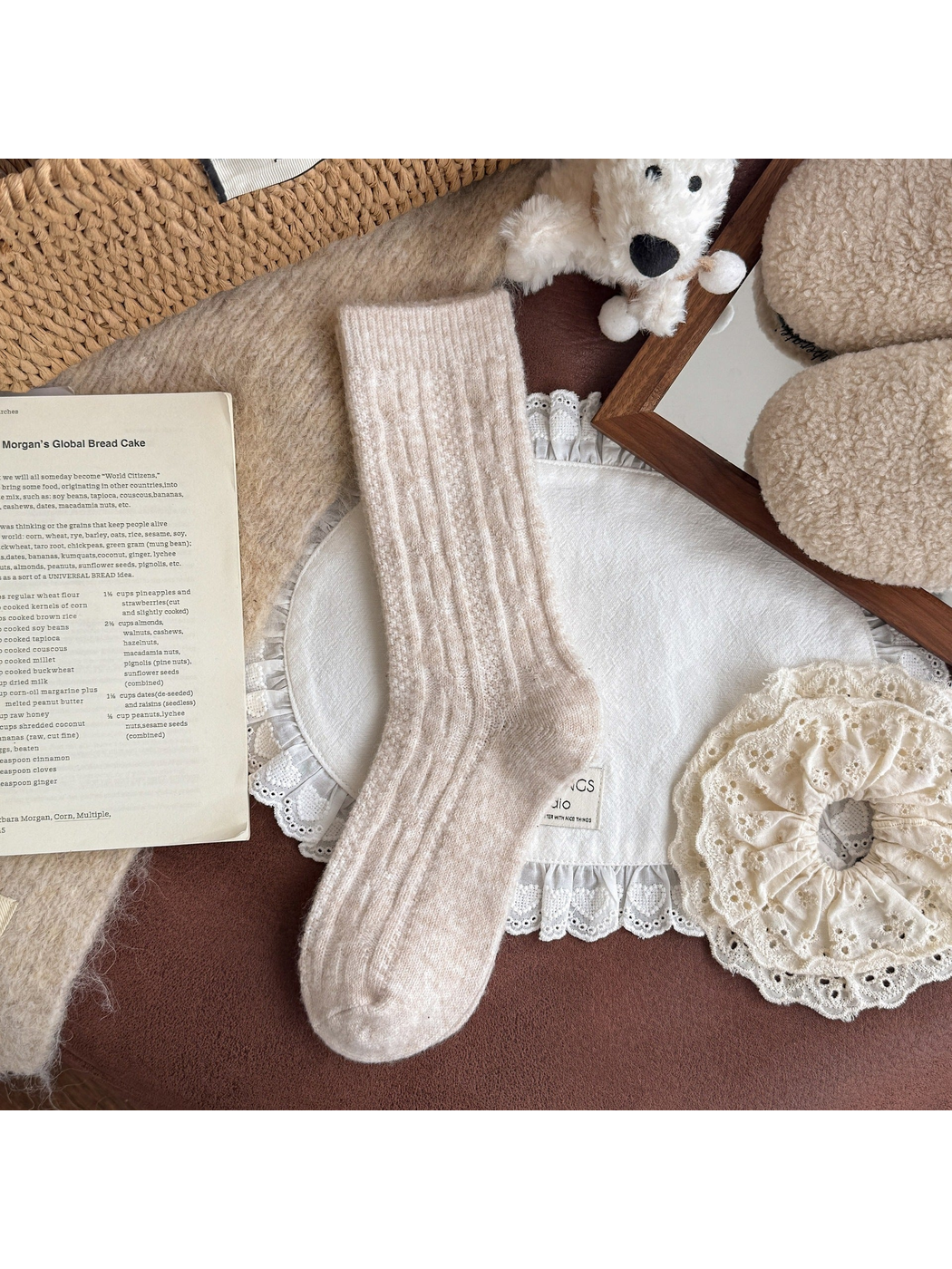 Beige patterned crew sock with ribbed cuff, full view