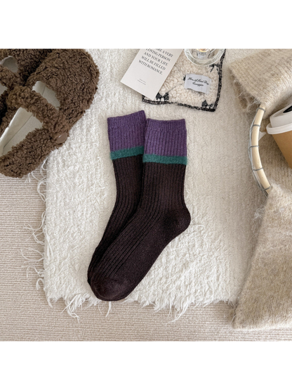 Brown ribbed crew socks with a purple cuff and teal fuzzy stripe