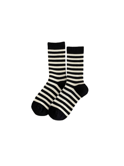 Black and ivory striped crew socks on a white background