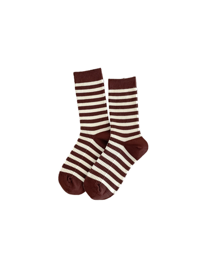 Coffee brown and ivory striped crew socks on a white background