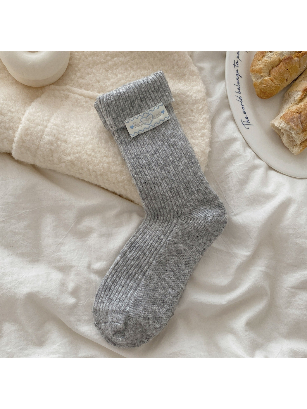 Heather gray ribbed crew sock with fold-over cuff and heart label