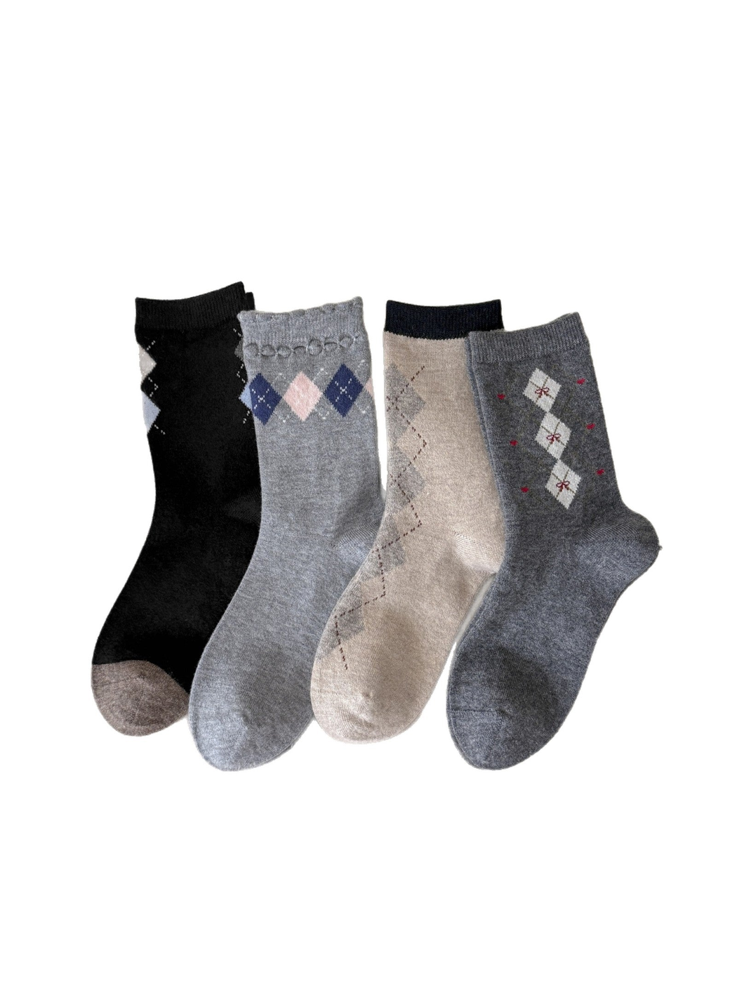 Four argyle crew sock styles displayed together on a white background