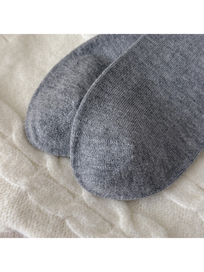 Close-up of the rounded sock toes and curved edge seams