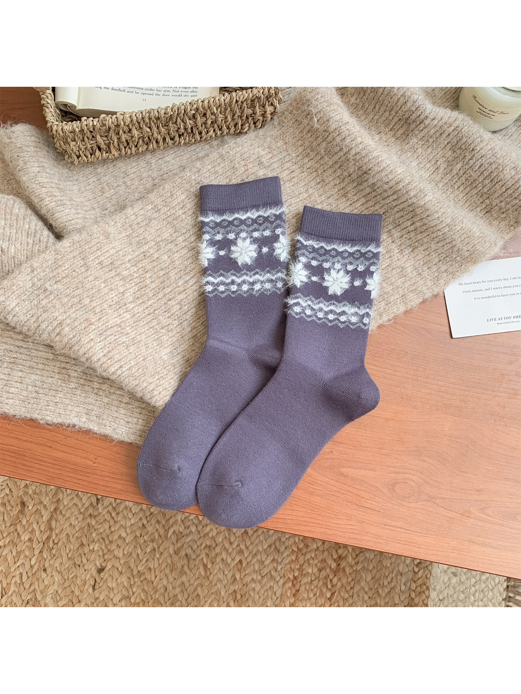 Purple crew socks with fuzzy snowflake pattern