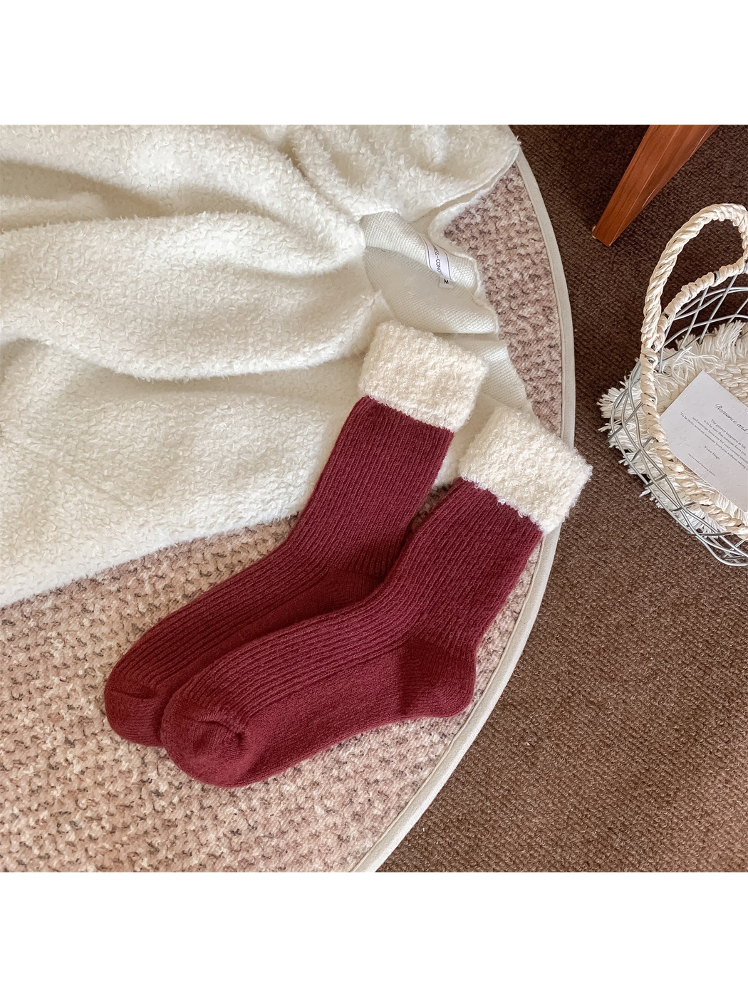 Burgundy ribbed crew socks with cream fuzzy fold-over cuffs