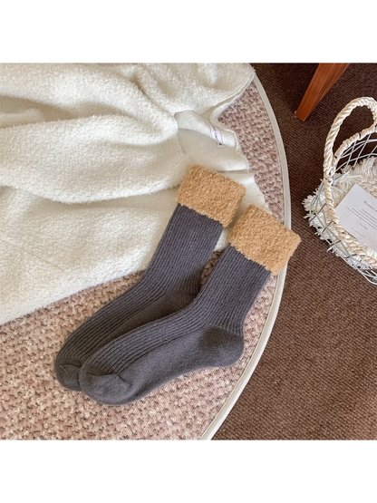 Gray ribbed crew socks with tan fuzzy fold-over cuffs