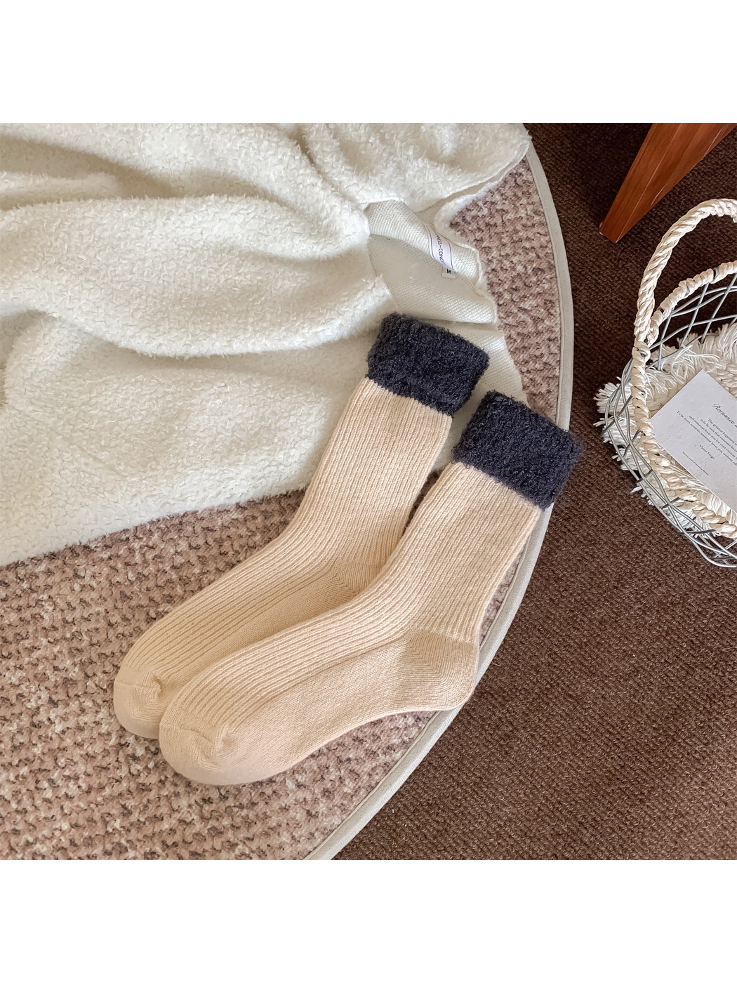 Cream ribbed crew socks with dark gray fuzzy fold-over cuffs