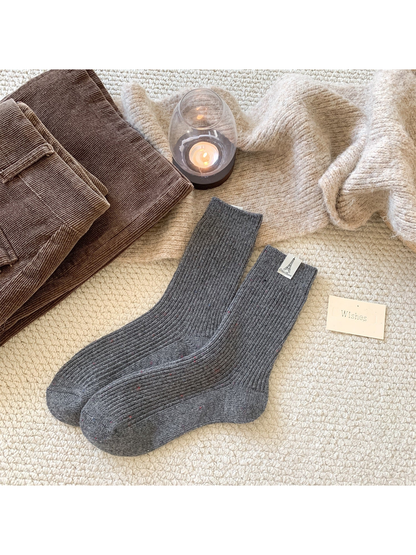 Dark gray ribbed crew socks with multicolor speckles, pair view
