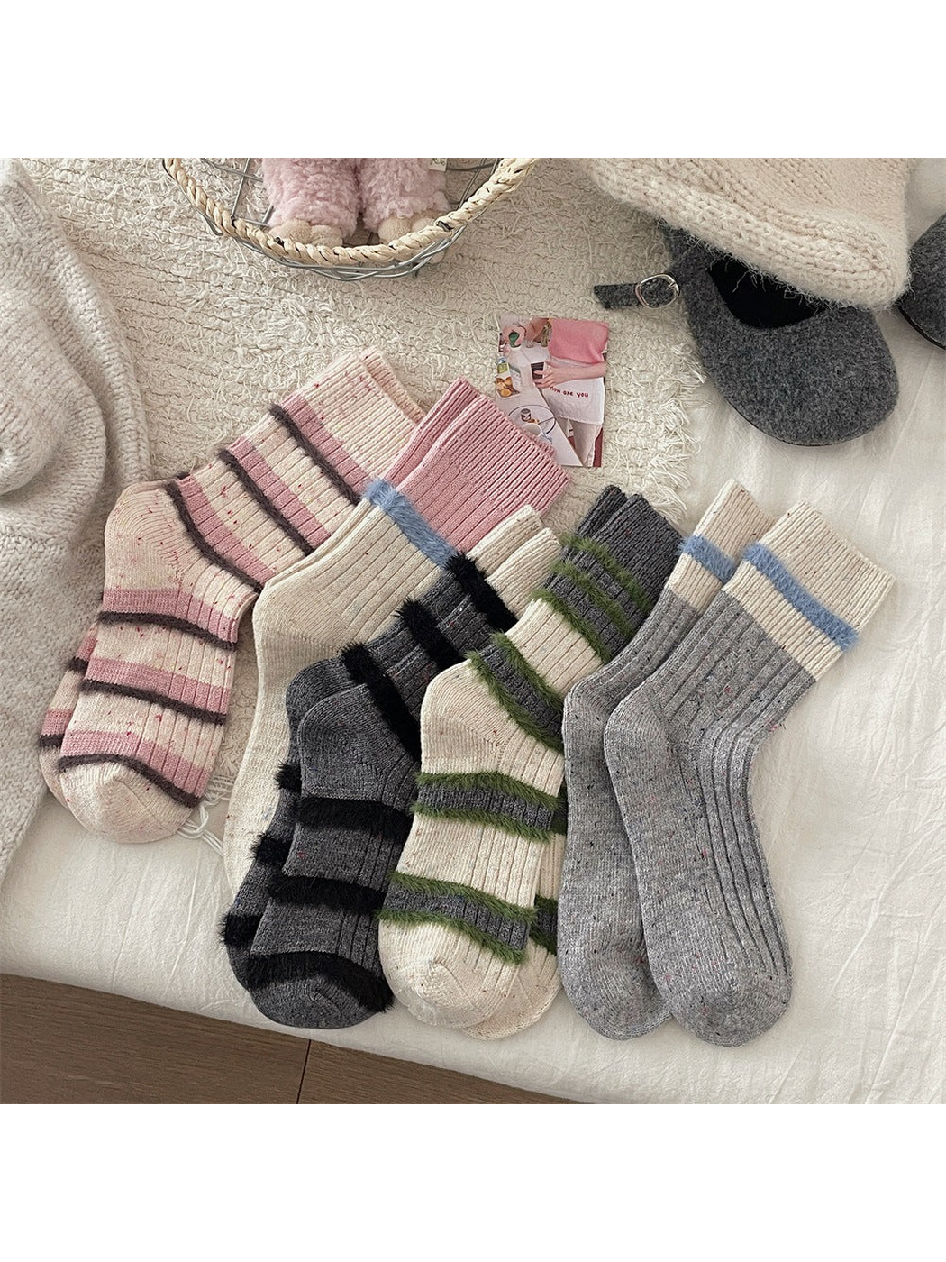 Five fuzzy-trim crew sock designs arranged together