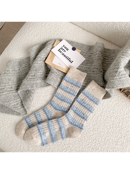 Ivory crew socks with pale blue fuzzy stripes