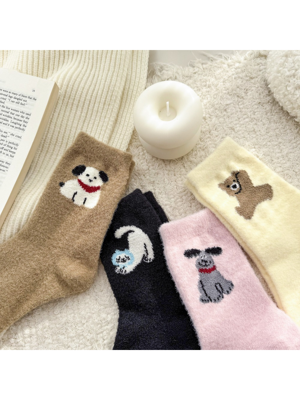 Close-up of the fuzzy texture and animal motifs across four sock styles