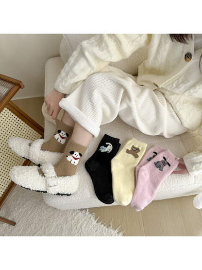 Brown white-dog-motif socks worn with the black, pale yellow and light pink styles displayed alongside