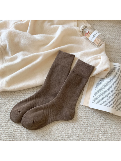 Brown solid-color crew socks with ribbed cuffs