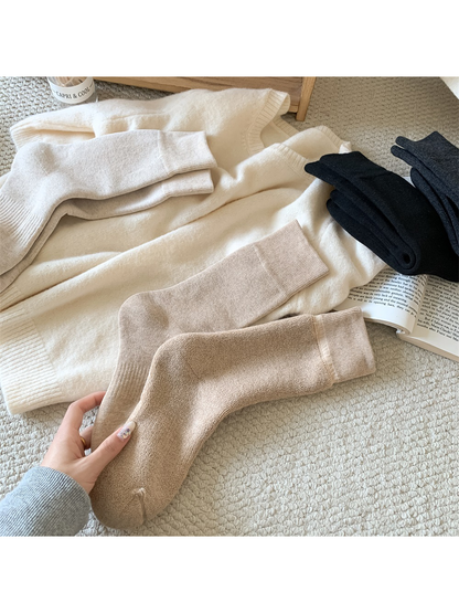 Khaki sock turned back to show its looped interior texture
