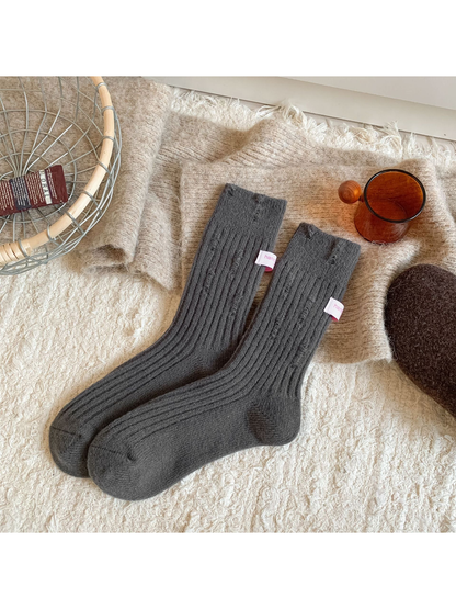 Dark gray ribbed crew socks with laddered detailing