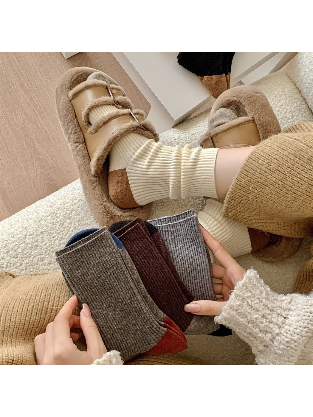Color-blocked ribbed crew socks styled with plush sandals