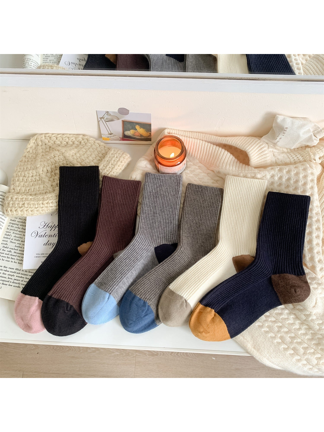 Assorted color-blocked ribbed crew socks arranged together
