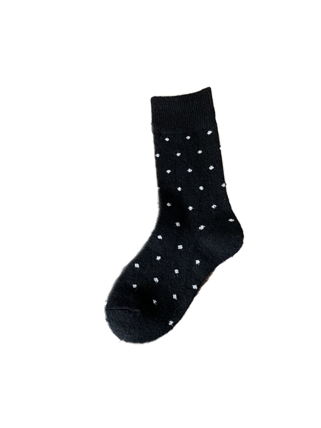 Black crew sock with contrasting polka dots on a white background