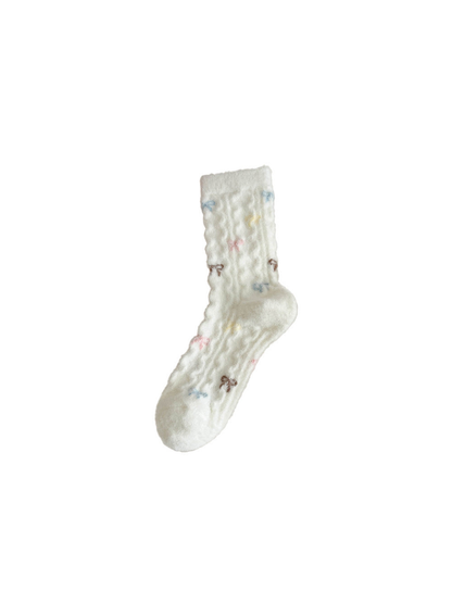 Ivory fuzzy-textured crew sock with scattered pastel bow motifs