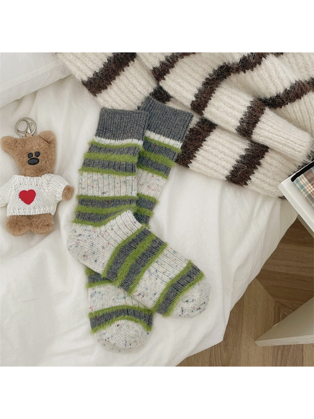 Green and gray striped speckled crew socks, full pair view