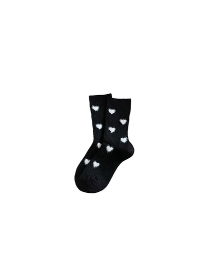 Black ribbed crew socks with fuzzy white heart motifs