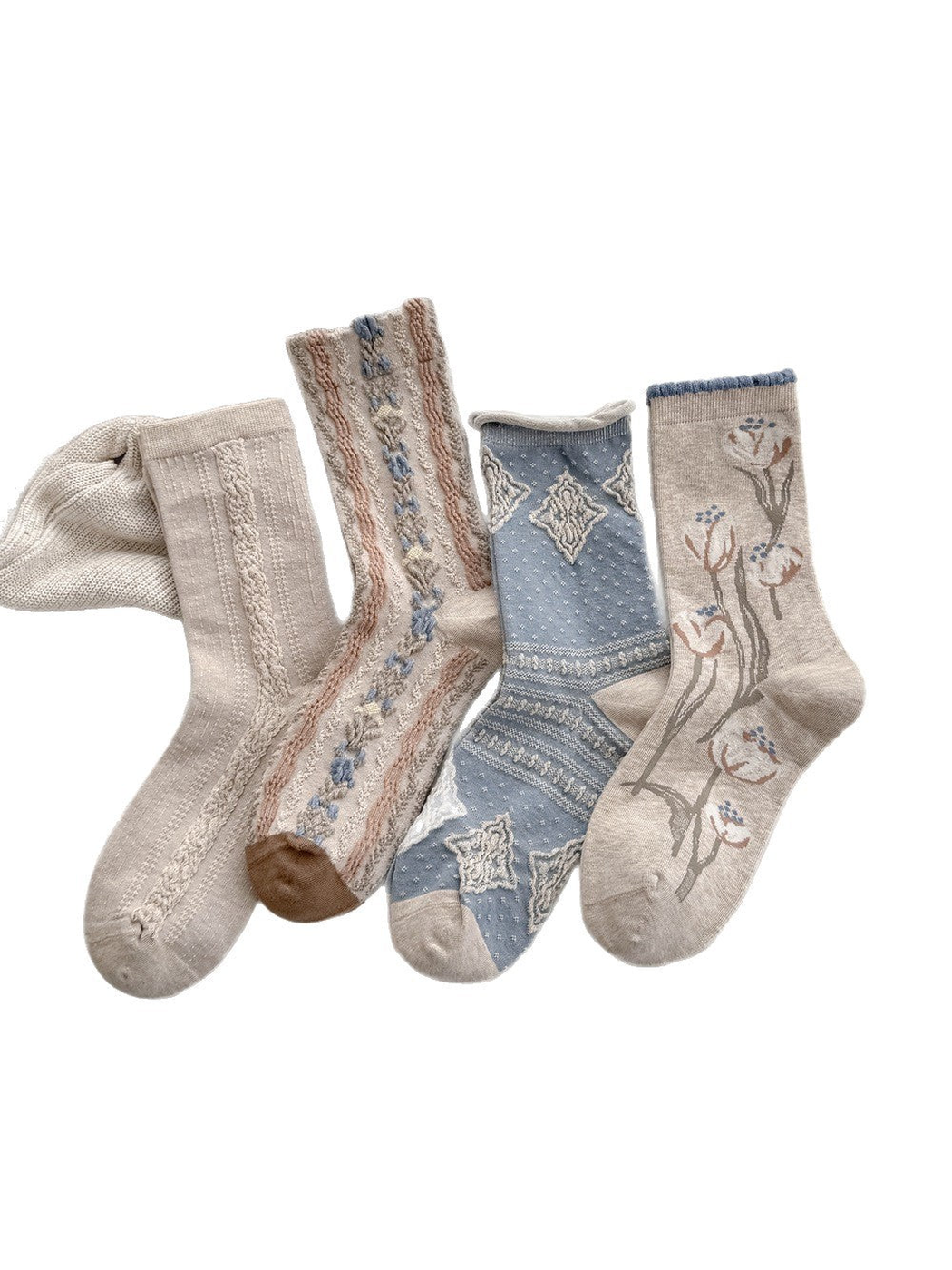Four crew sock designs displayed together on a white background