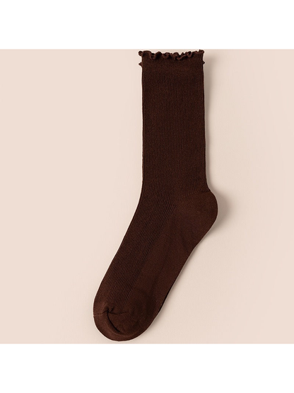 Dark coffee ribbed crew sock with a ruffled cuff