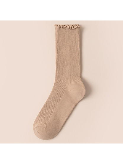 Beige ribbed crew sock with a ruffled cuff