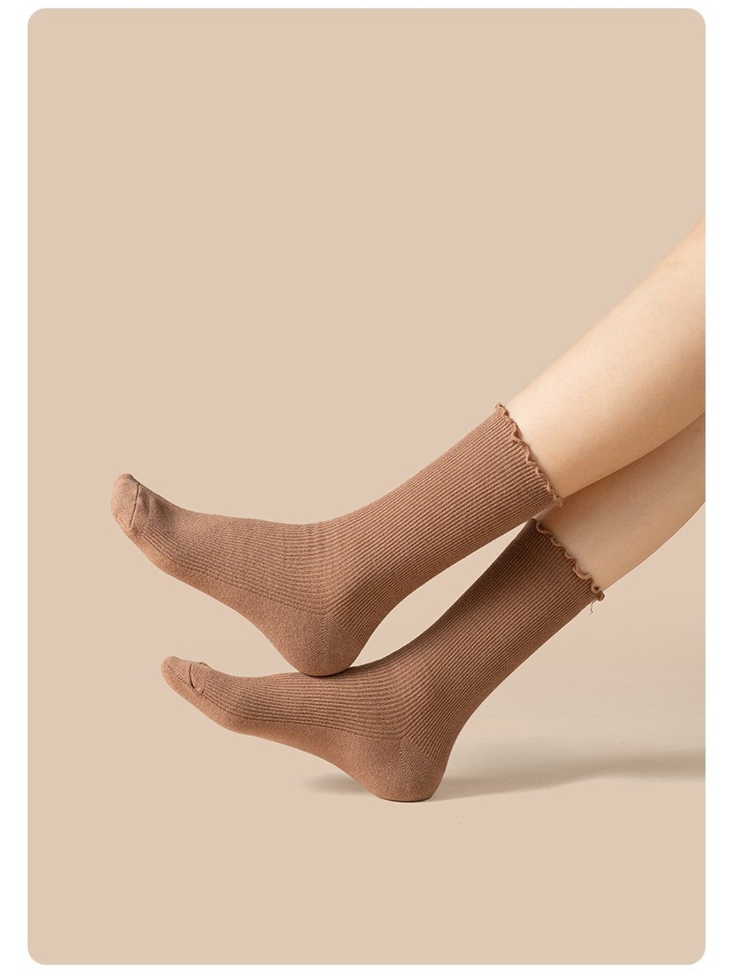 Light coffee ribbed crew socks worn in a raised-leg side view