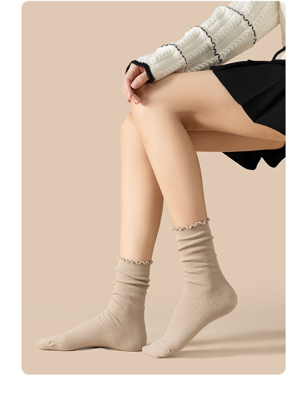 Beige ribbed crew socks with gathered ruffled cuffs