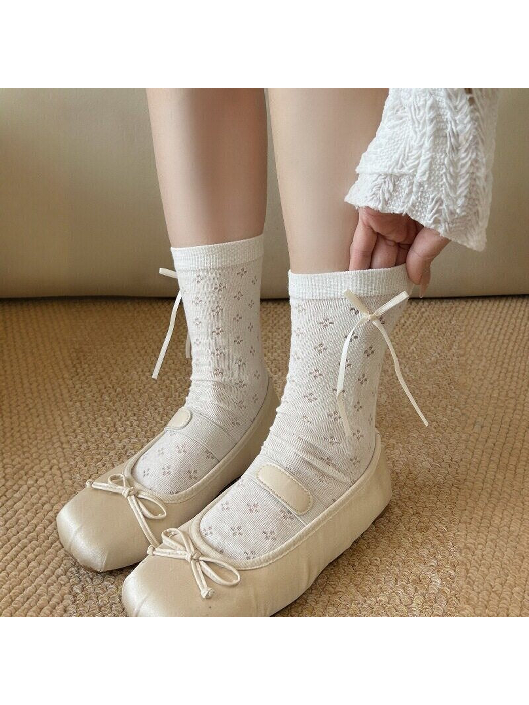 Ivory floral crew socks styled with cream ballet flats